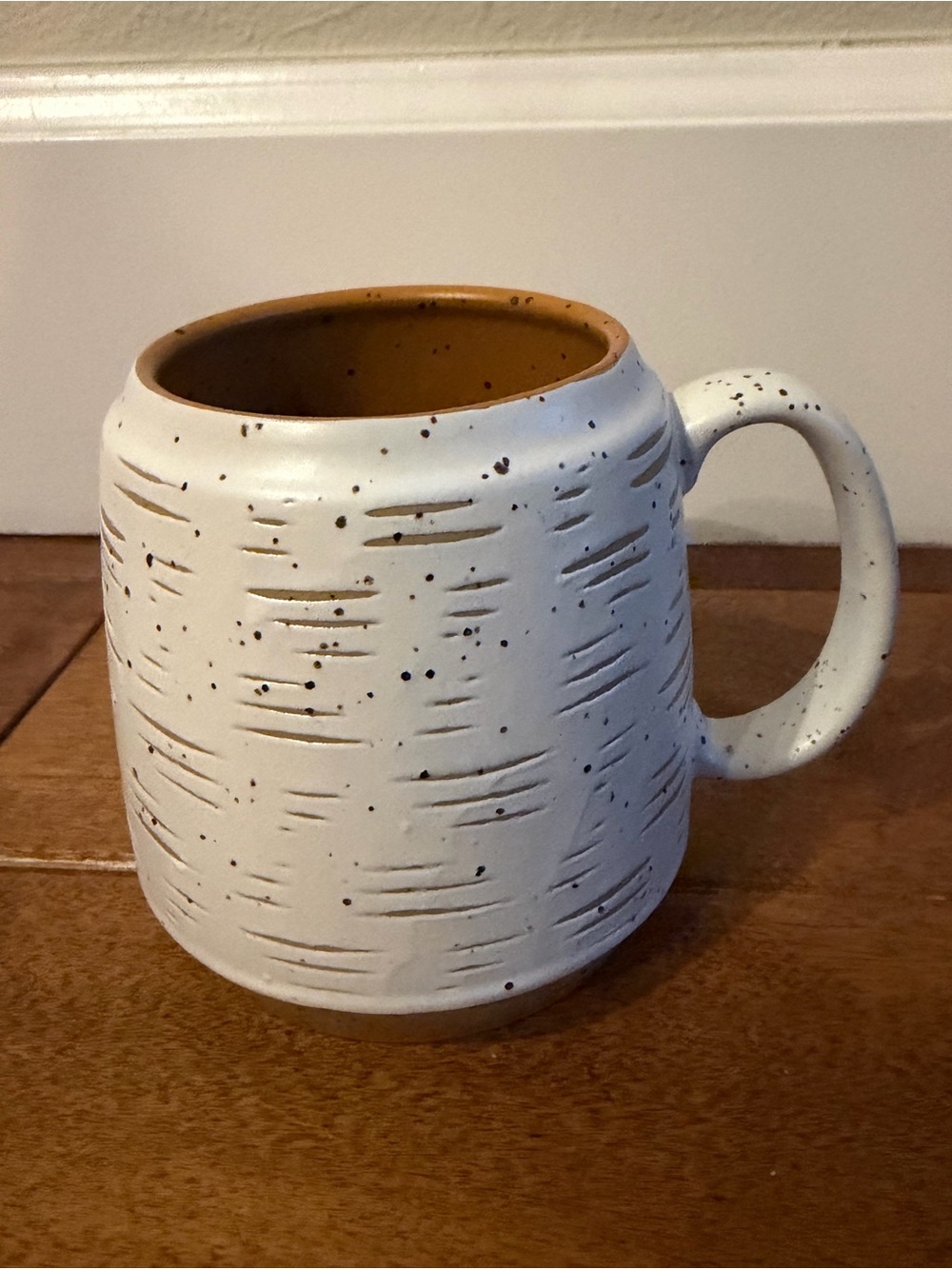 United By Blue White Speckled Ceramic Mug with Brown Interior